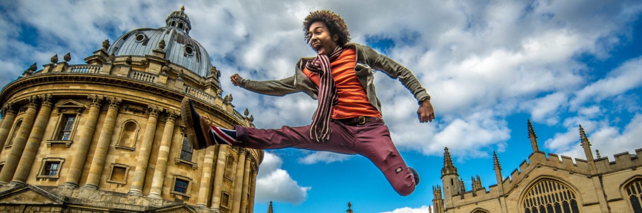 Scio Study Abroad Radcliffe Camera Student Jumping